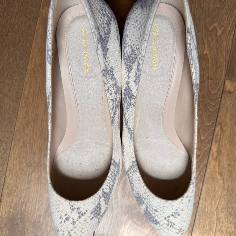 Never worn Cole Haan heels.  Slightly dusty inside